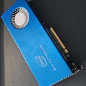 A stylish picture of a Xeon Phi card that is askew and laying down, casting an atmospheric shadow.